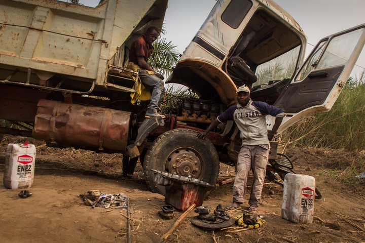 cameroon men repairing truck 720x480